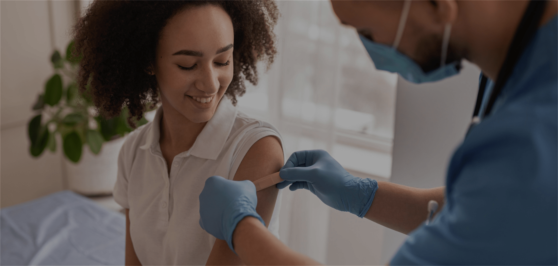 A woman who received a vaccination service by the health professional